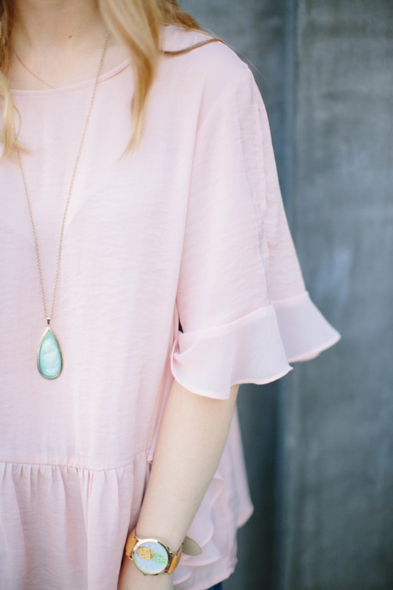 Everyone needs a pink ruffle top that is this versatile in their closet. This top I have worn so many different ways, and I love that it's work appropriate while being so flirty and trendy. Versatile, yet on-trend pieces are a staple for your closet.